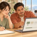 Colleagues reviewing an online workplace training course together